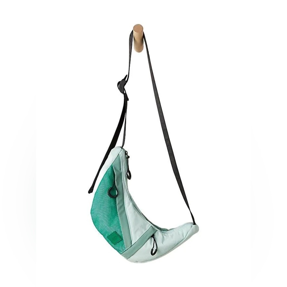 Free People Movement Nothin But Net Sling Bag. 
Blue/green 
NWT